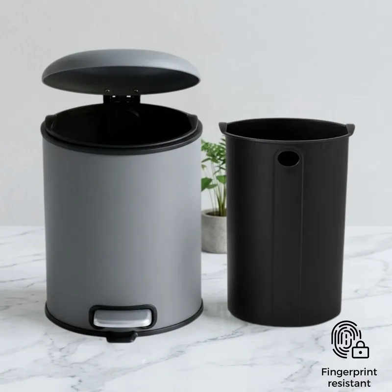 Grey dustbin with lid open beside removable black inner bucket