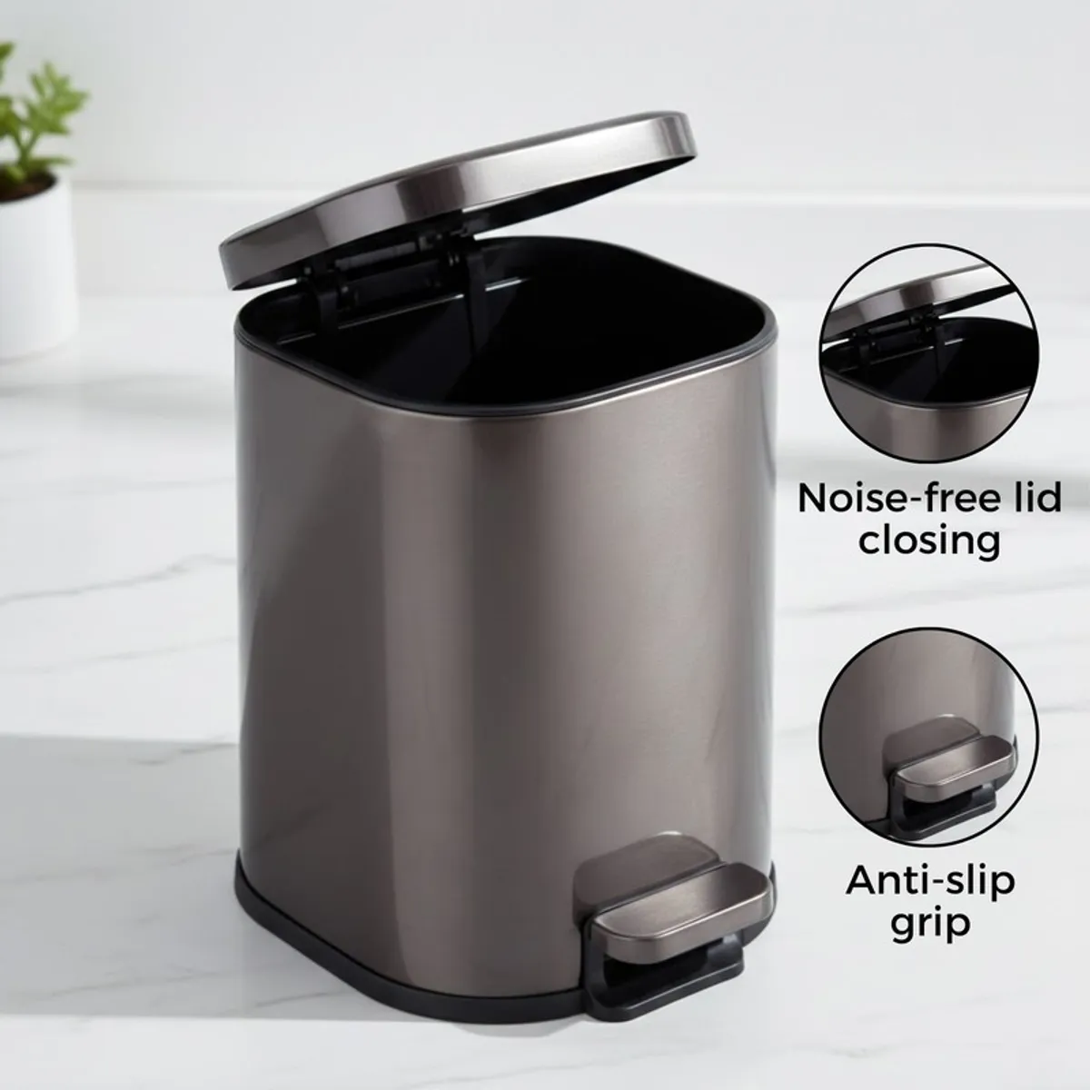 Black and silver dustbin shown open with foot pedal detail