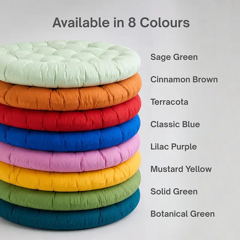 Stack of round floor cushions in multiple colours including lilac, blue, green and yellow.