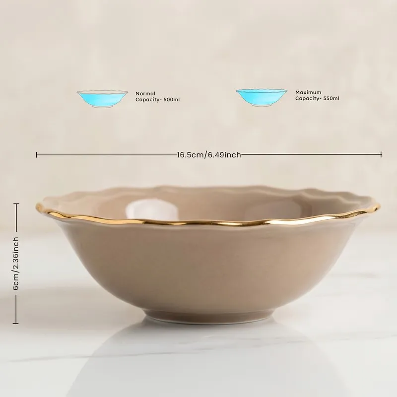 Close view of a grey serving bowl with gold rim