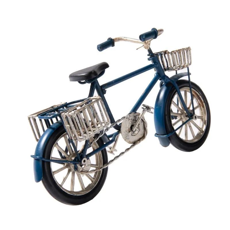 Rear angled view of dark blue bicycle showpiece with silver basket details