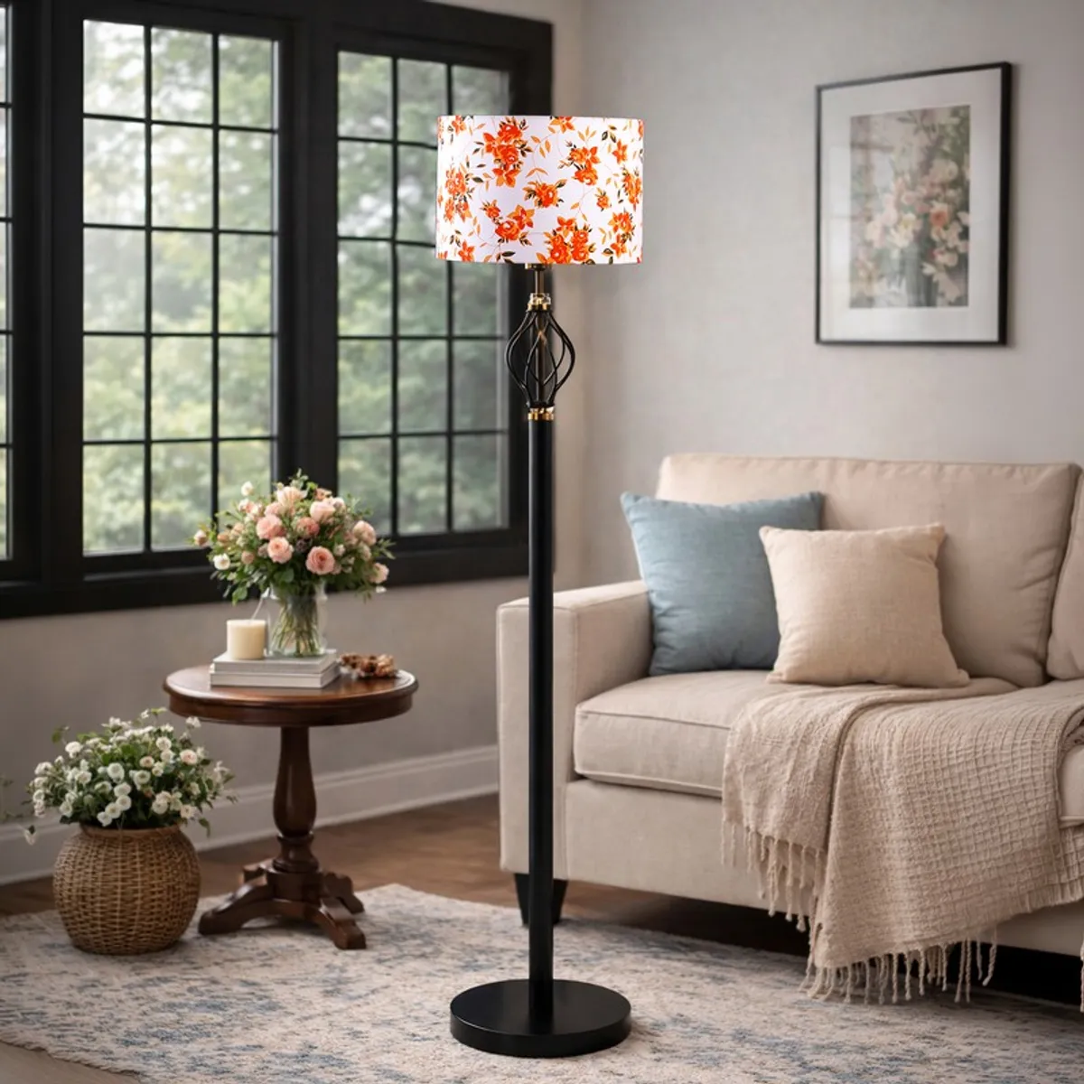 Floral floor lamp in a living room beside a sofa and round side table