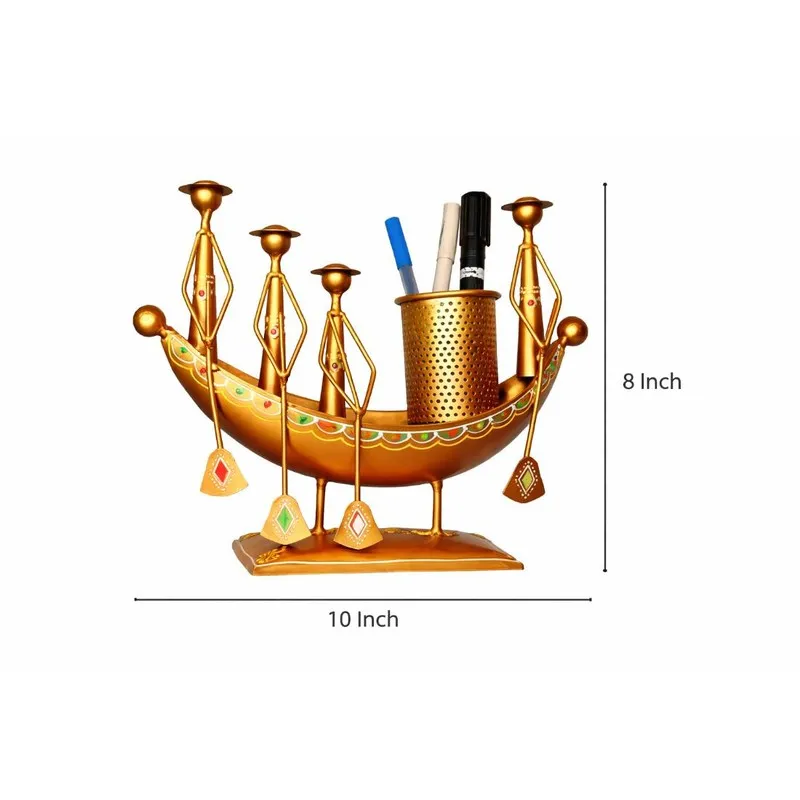 Gold decorative pen stand with boat shape shown with 10 inch width and 8 inch height