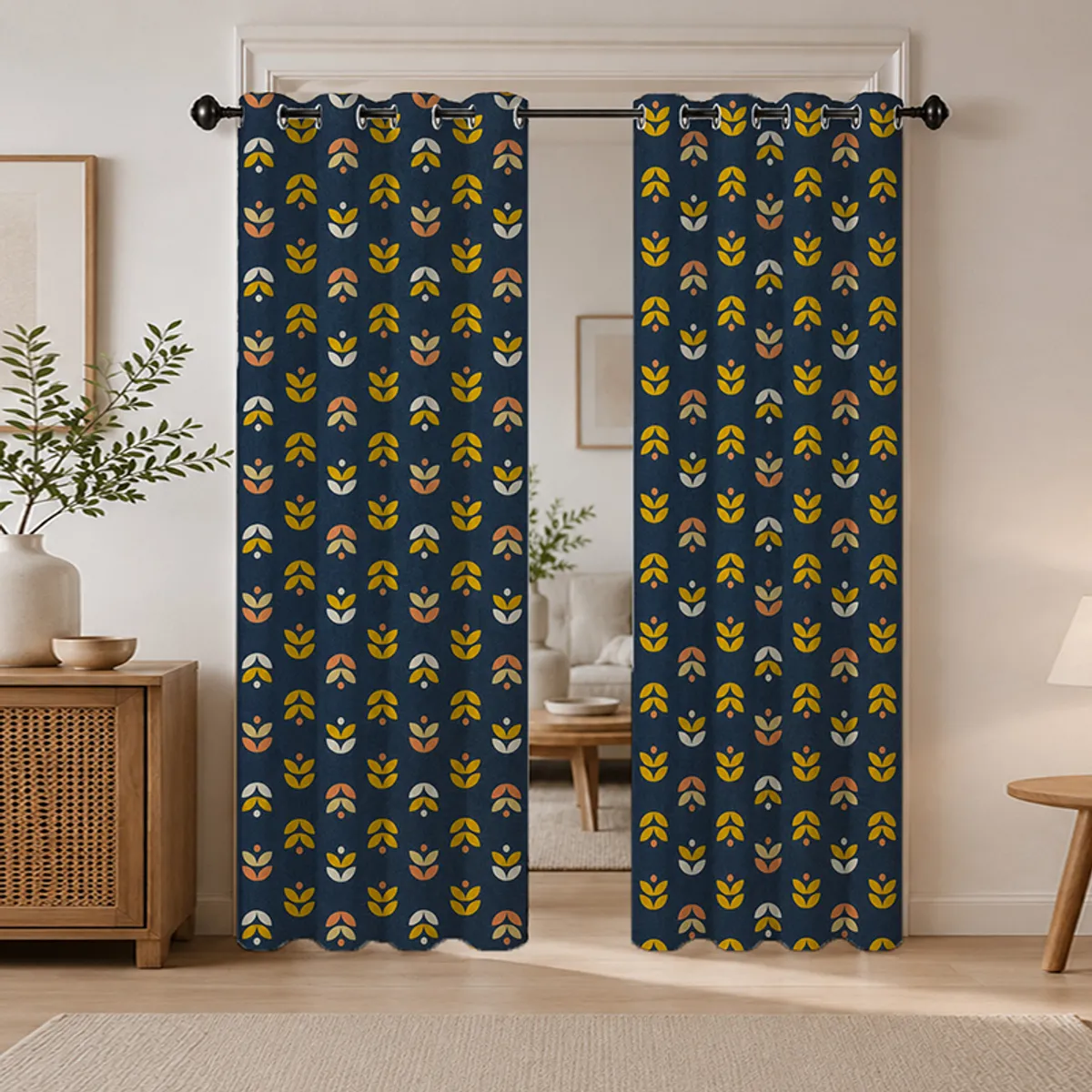 Two blue patterned eyelet curtains on a black curtain rod