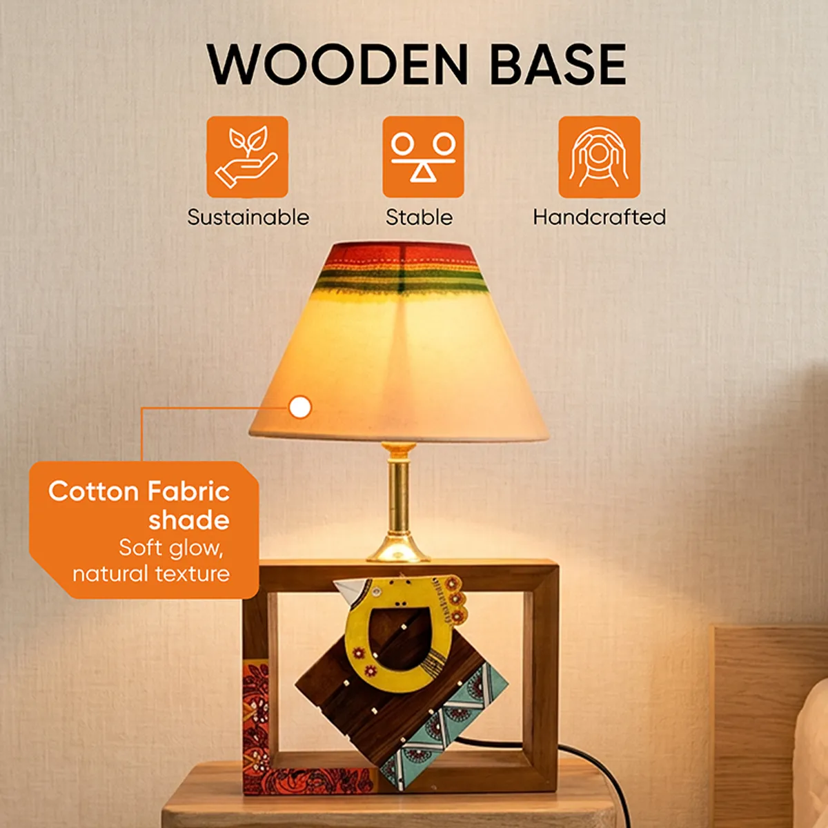 Wooden table lamp with cotton shade and colourful decorative base detail