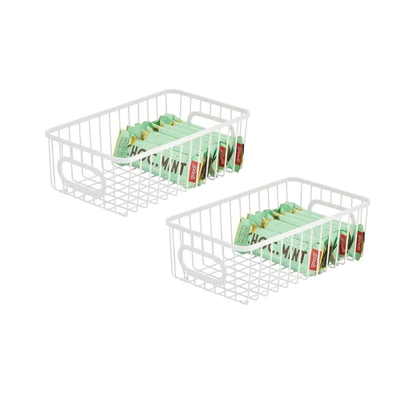 Set of two white rectangular wire baskets with packets stored inside