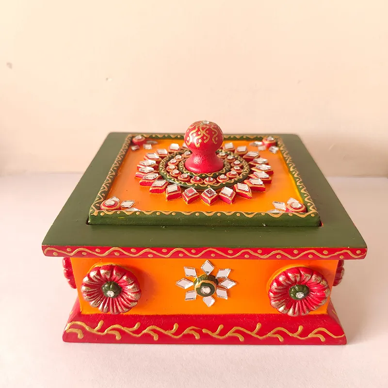 Front view of multicolour ornate square storage box with lid