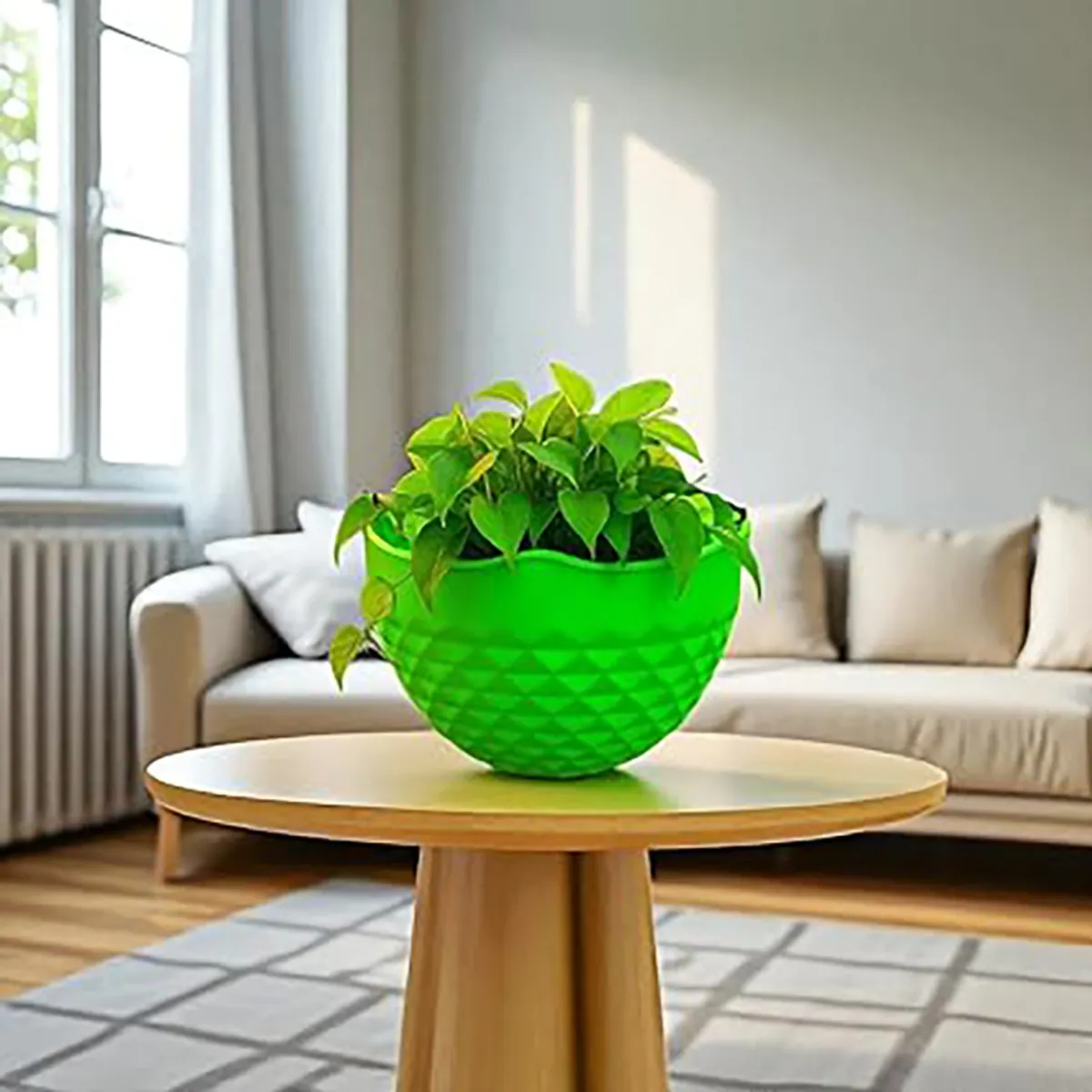Bright green textured planter with leafy plant styled in a bright living room.