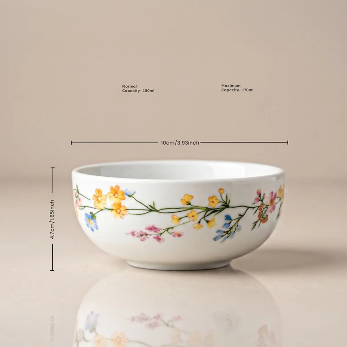 White porcelain bowl with multicolour floral vine detailing on the outer surface