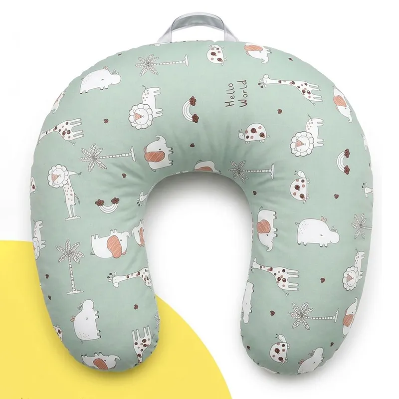 Front view of green U-shape feeding pillow with animal and palm tree print