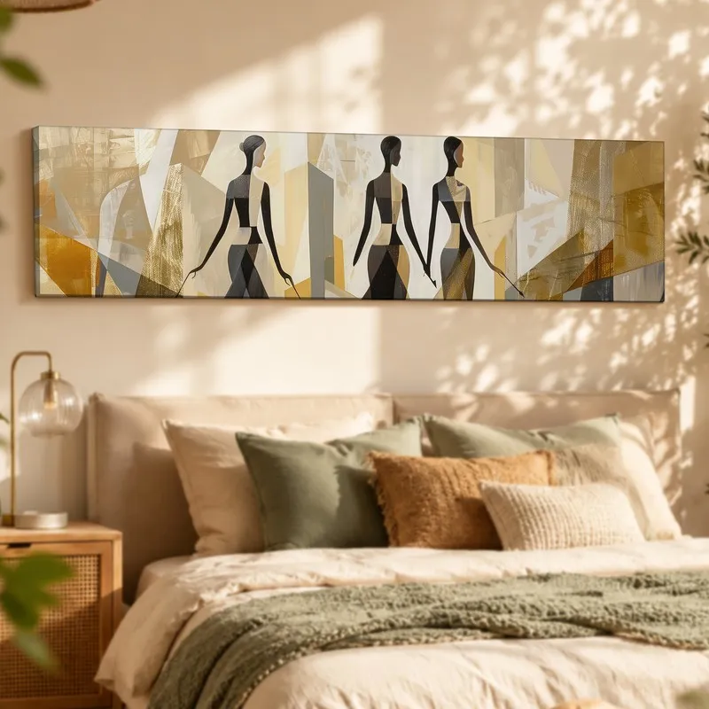 Panoramic abstract silhouette canvas in earthy gold and beige tones above a bed