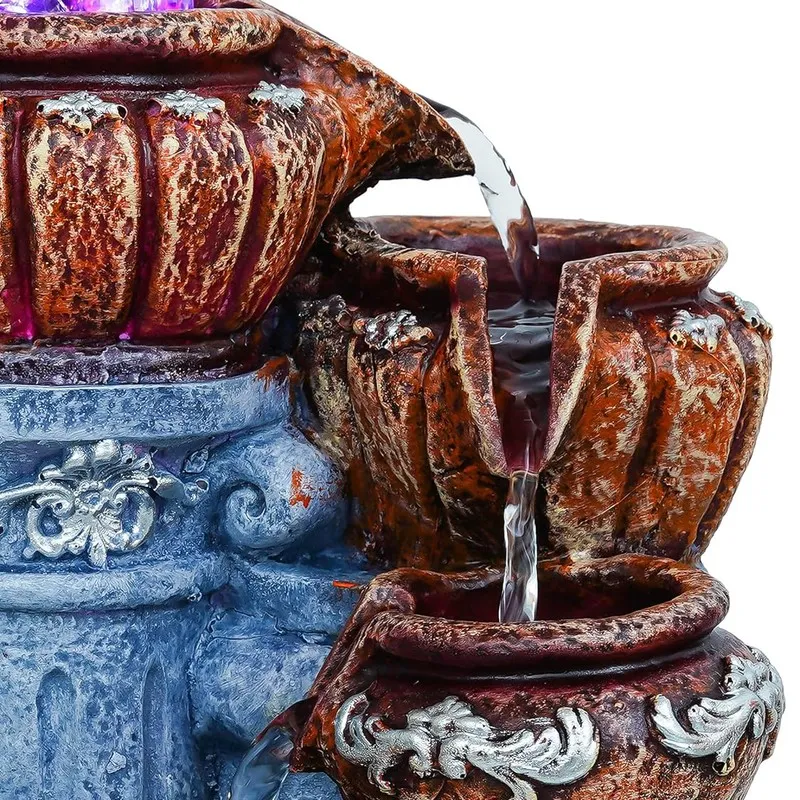 Close-up of the upper water stream and carved bowl details