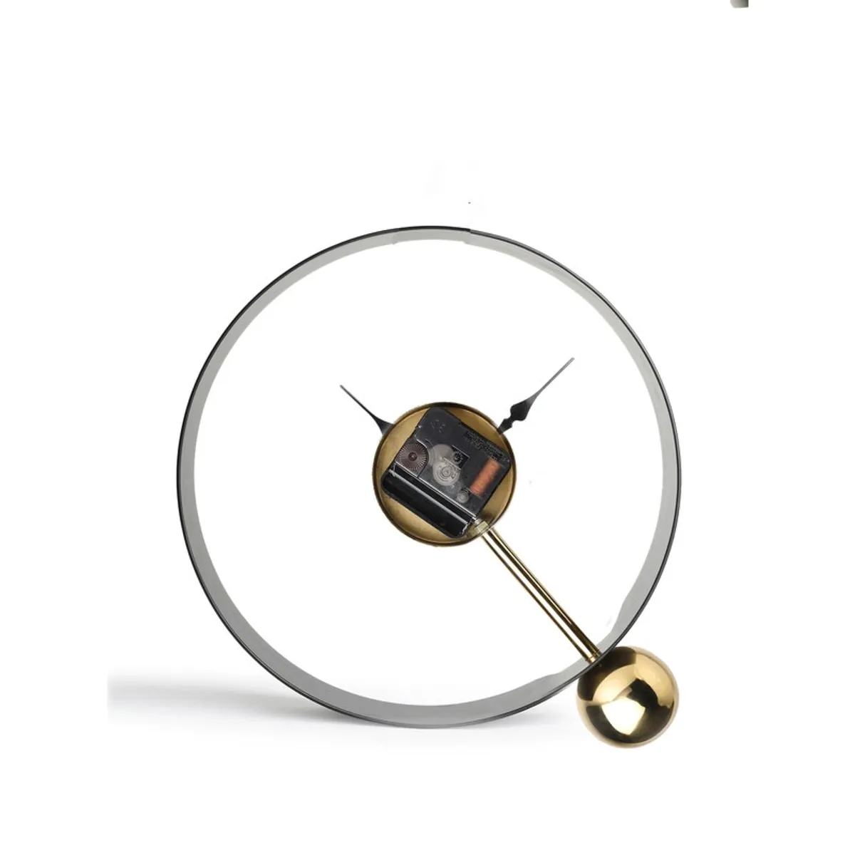 Rear view of black and gold round table clock