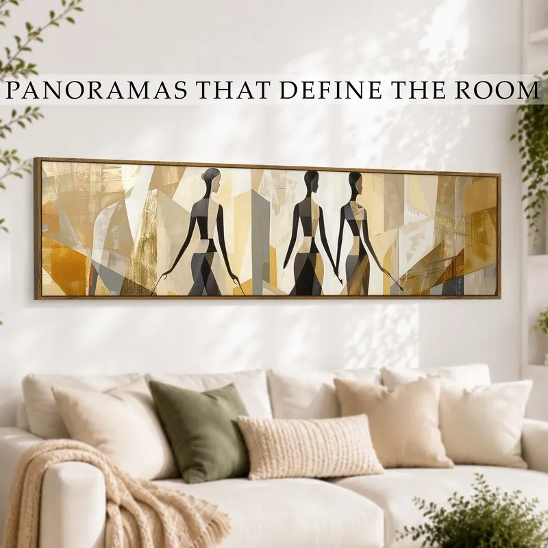 Wide framed silhouette artwork styled above a white sofa in a bright room