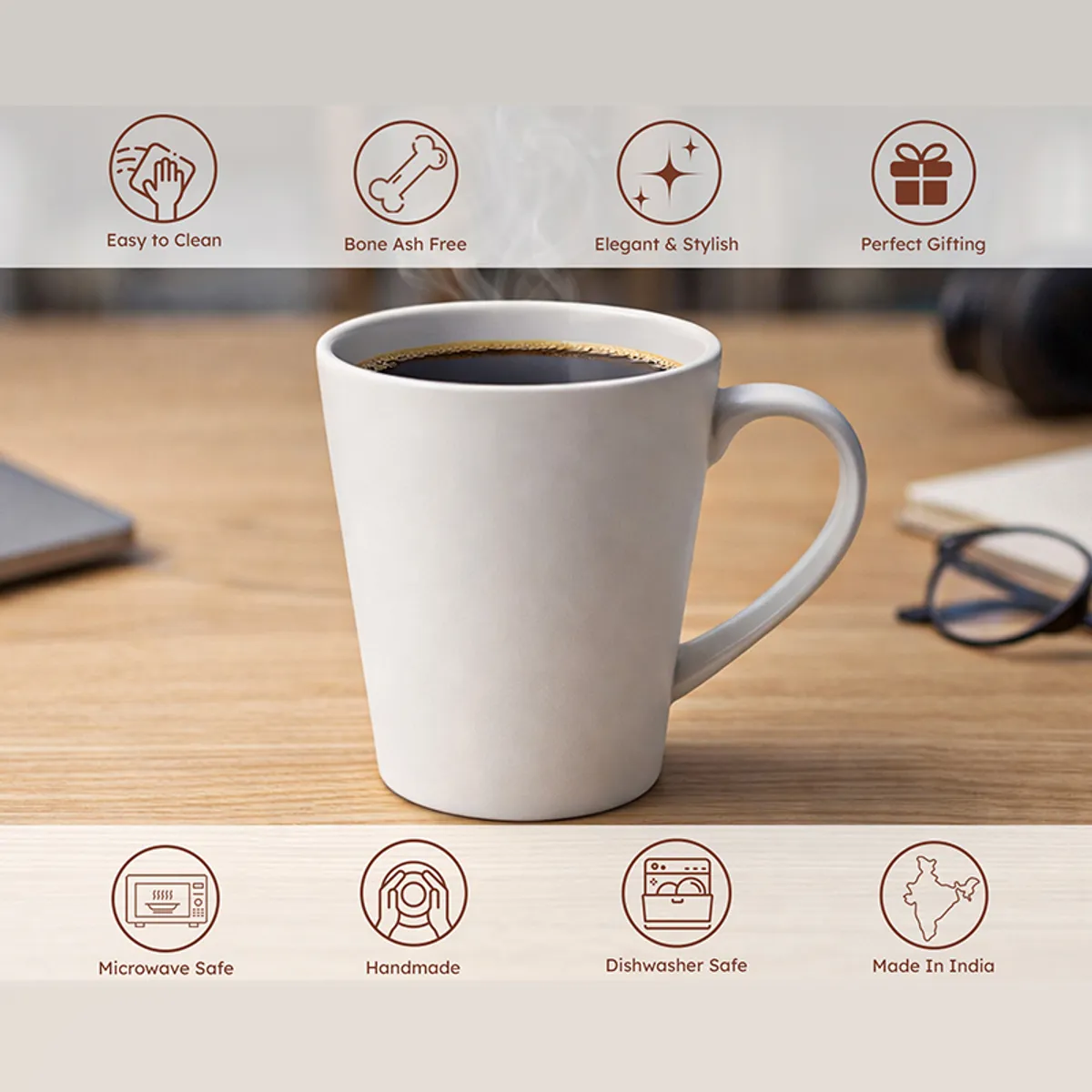 Single white ceramic mug filled with coffee on a wooden desk