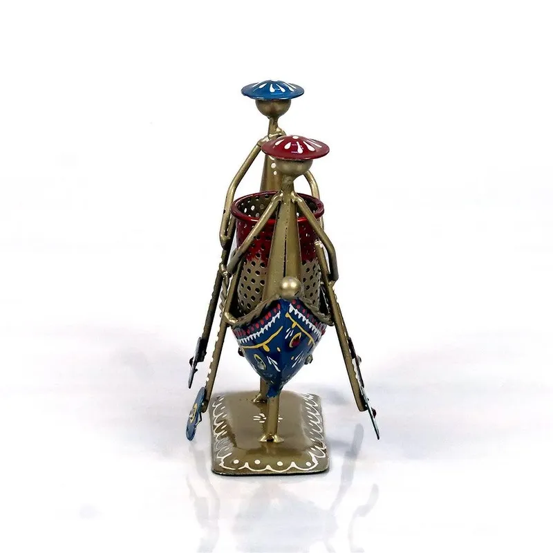 Side view of multicolour metal pen stand shaped like a decorative boat