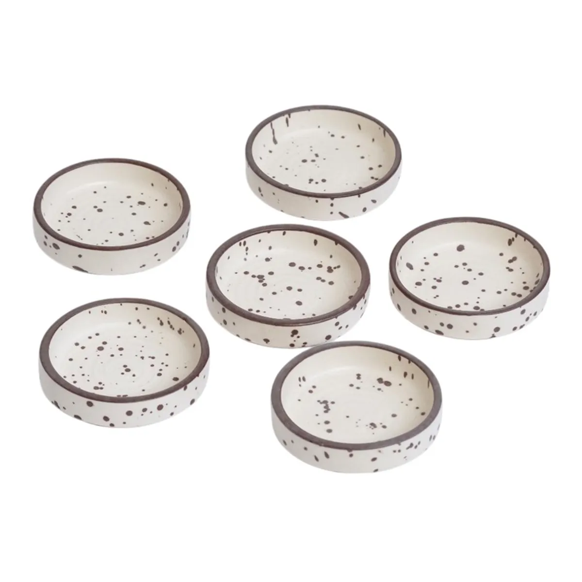 Six round white speckled dip bowls with dark rims on a white background