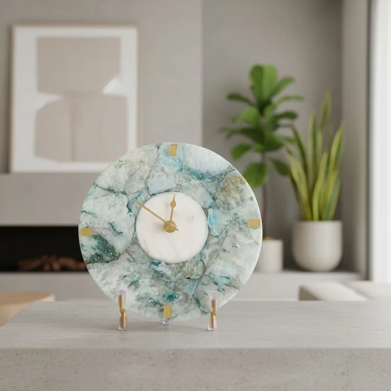 Blue and white agate table clock with gold details styled on a mantel