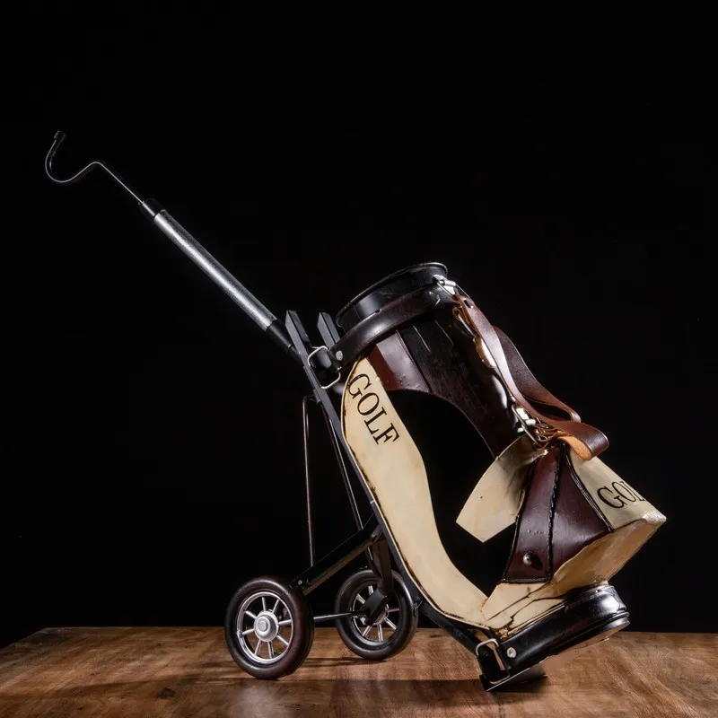 Side view of miniature golf kit showpiece with trolley-style design