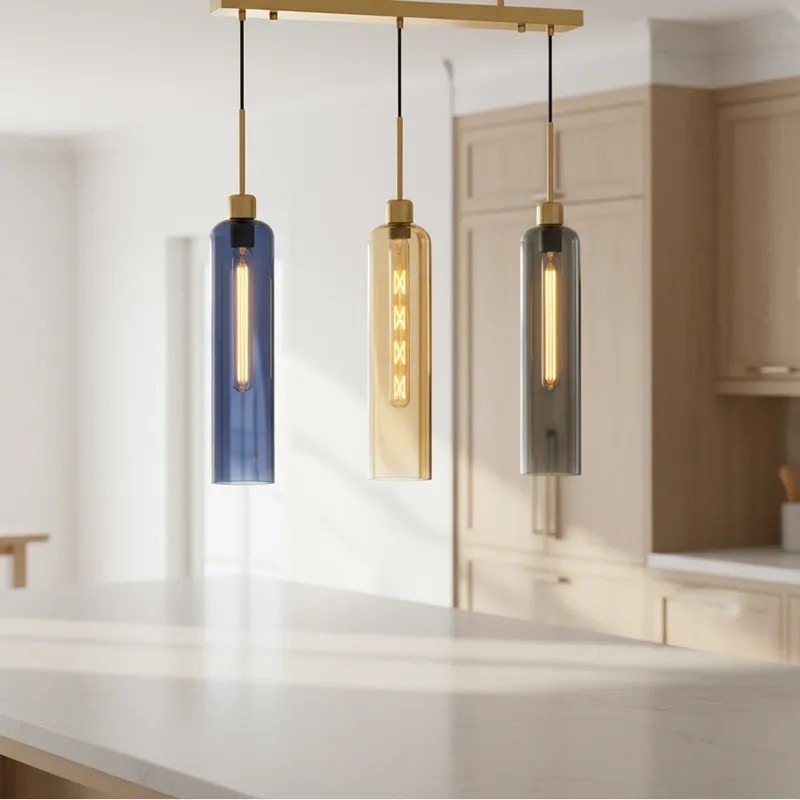 Ceiling-mounted linear lamp with blue, amber and grey glass shades over a counter