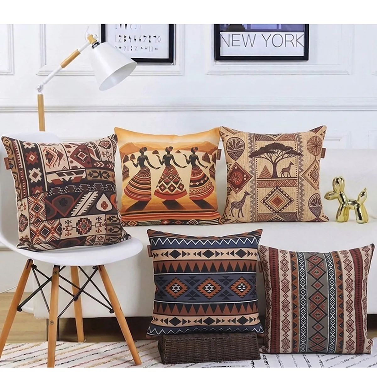 Five multicolour printed cushion covers arranged on chairs and a bench