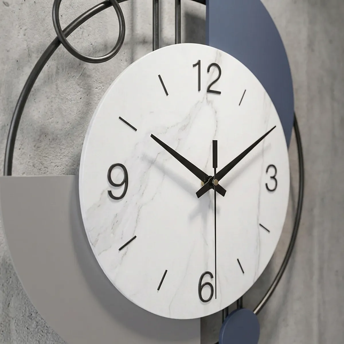 Close-up of the analog clock face with geometric metal frame details