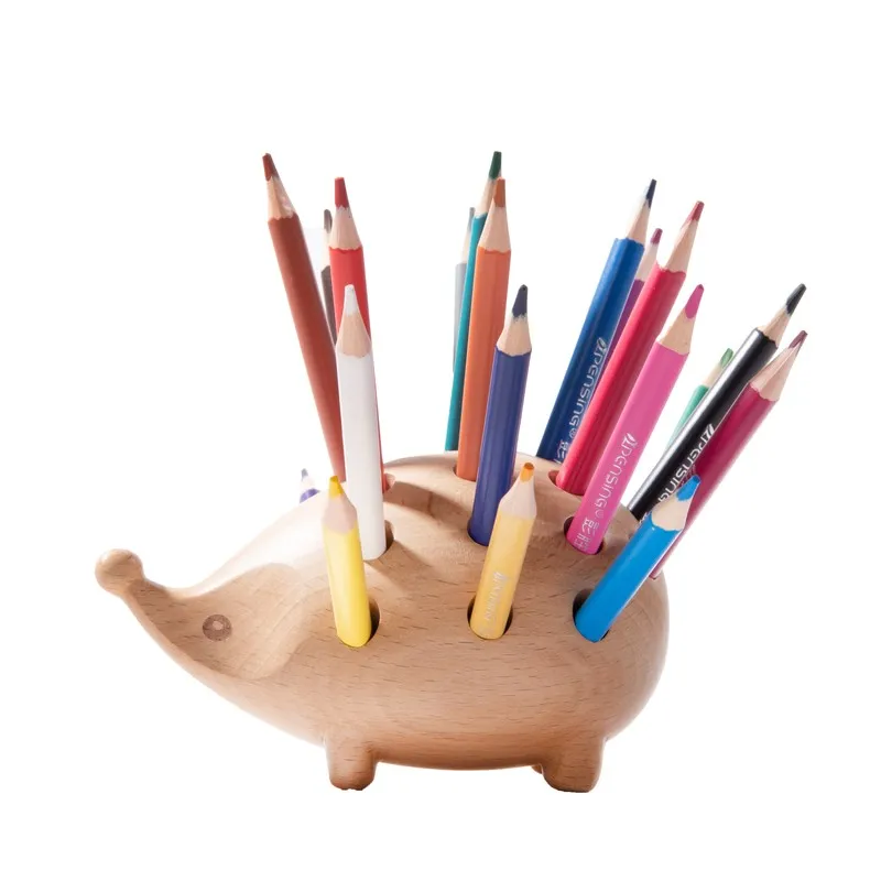 Side profile of hedgehog wooden desk organiser with pencils