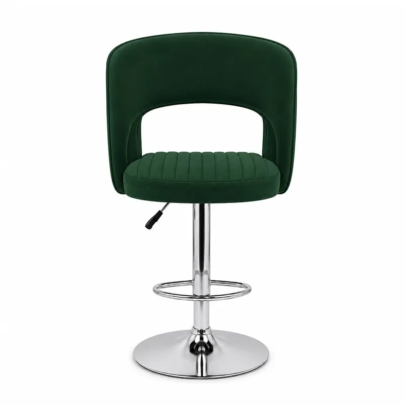 Back view of green velvet bar chair with open-back curved silhouette