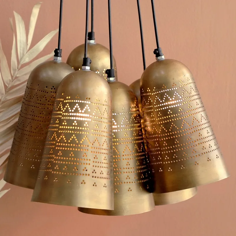 Cluster of gold bell-shaped pendant shades with perforated detailing