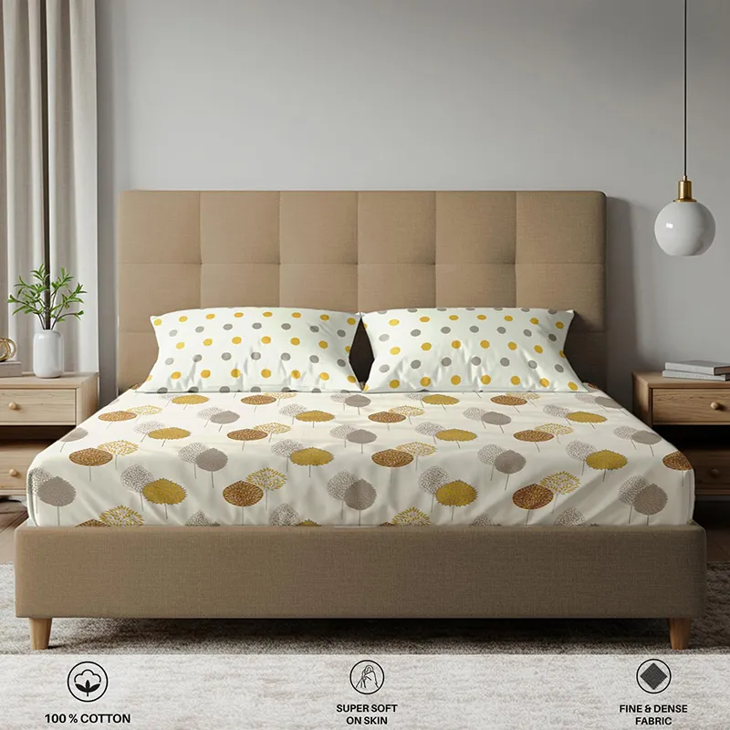 Front view of white and yellow printed bedsheet with matching pillow covers
