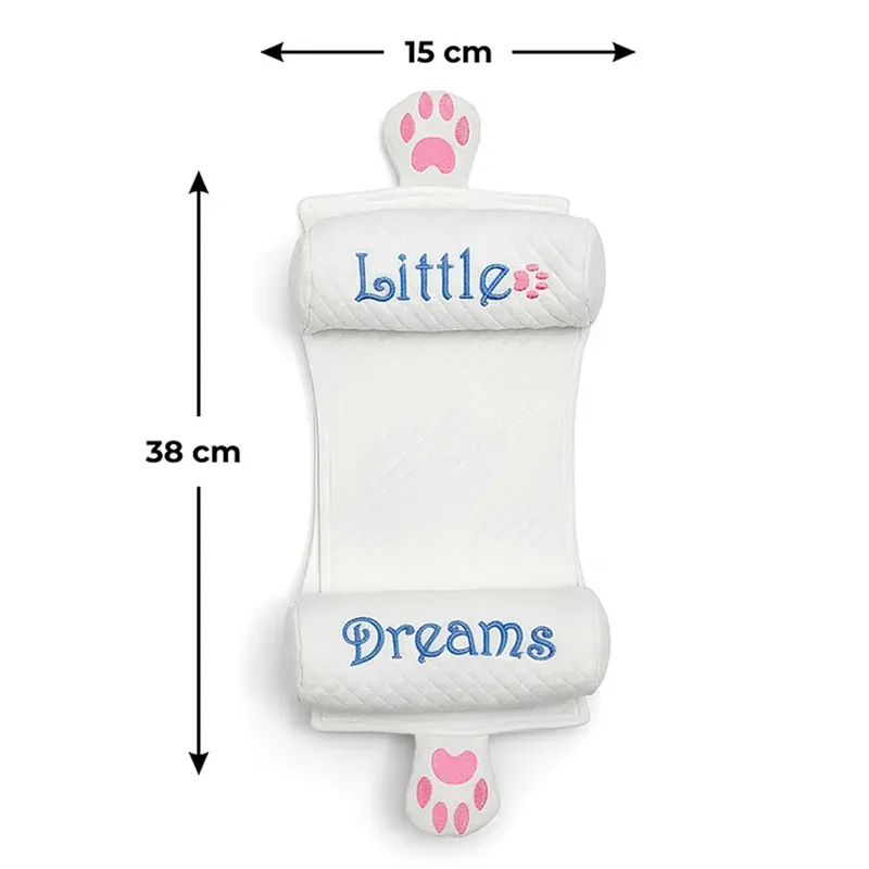 Front view of white baby neck pillow with embroidered rollers and paw tabs