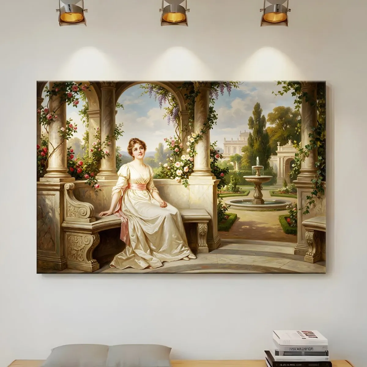 Courtyard scene canvas wall art hung under warm spotlights above a tabletop
