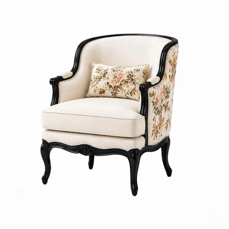 Off-white accent chair with black carved frame and floral cushion on white background