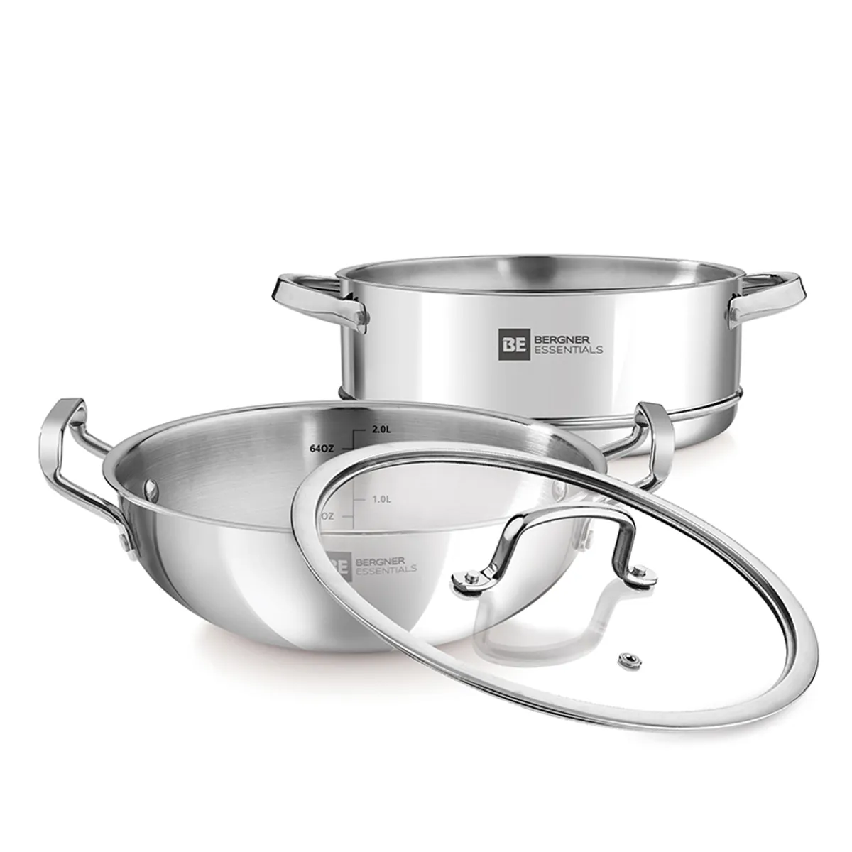 Silver kadhai, steamer and glass lid arranged separately on a white background