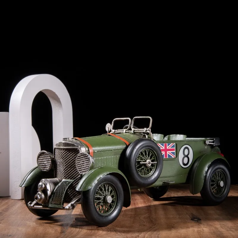 Angled view of olive green vintage racer showpiece on a tabletop