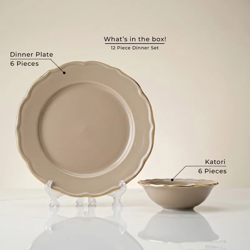 Single grey plate and matching bowl with scalloped edges and gold rim