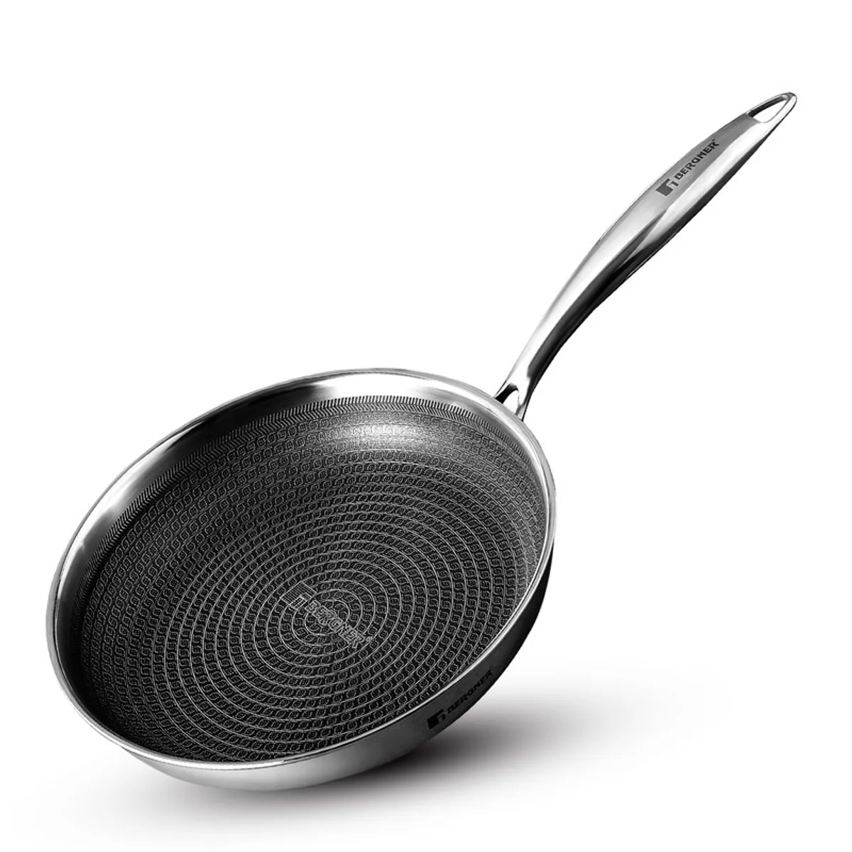 Silver frying pan showing its patterned non-stick interior