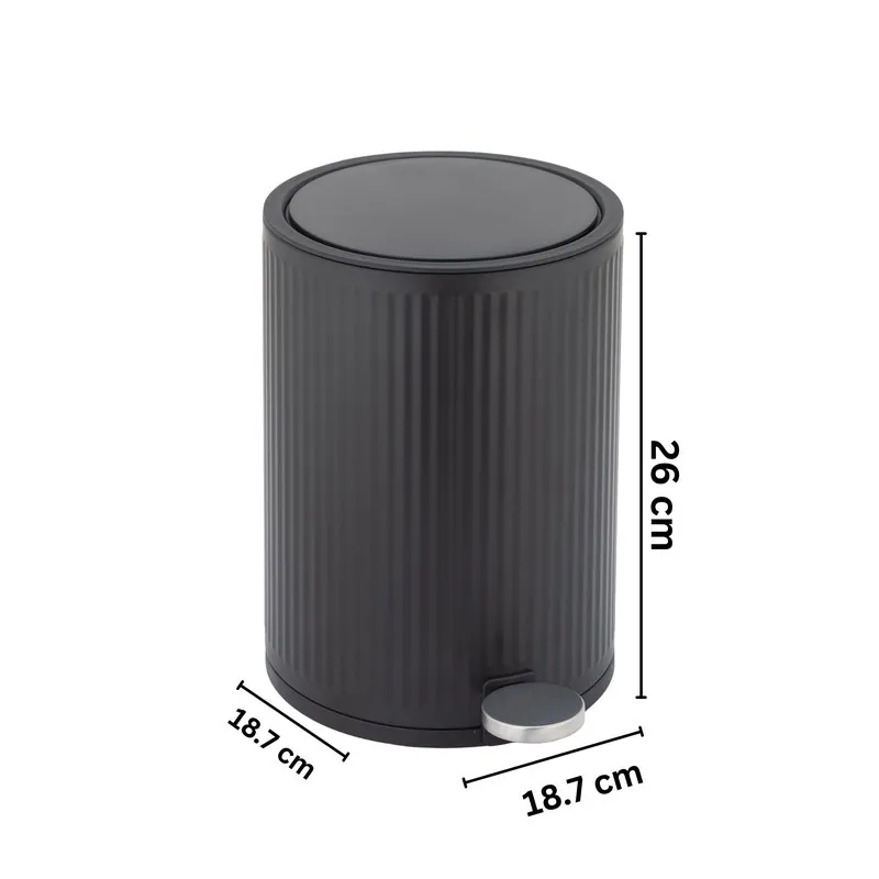 Black cylindrical dustbin with ribbed body on white background