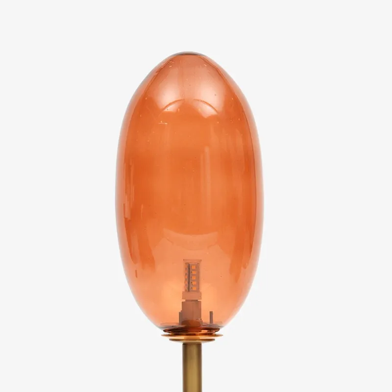 Close-up front view of the amber oval glass shade