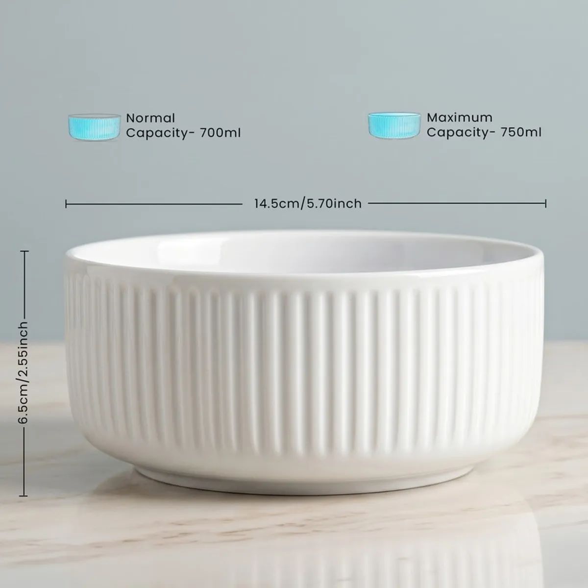 White round ribbed serving bowl shown in a close side view