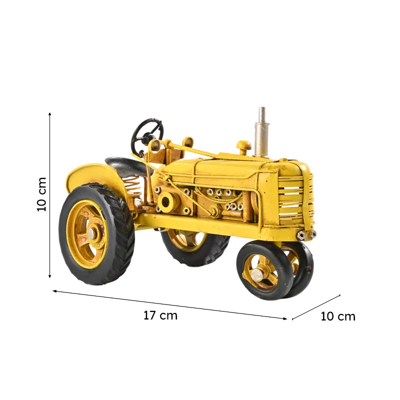 Yellow tractor showpiece with dimensions shown in the image